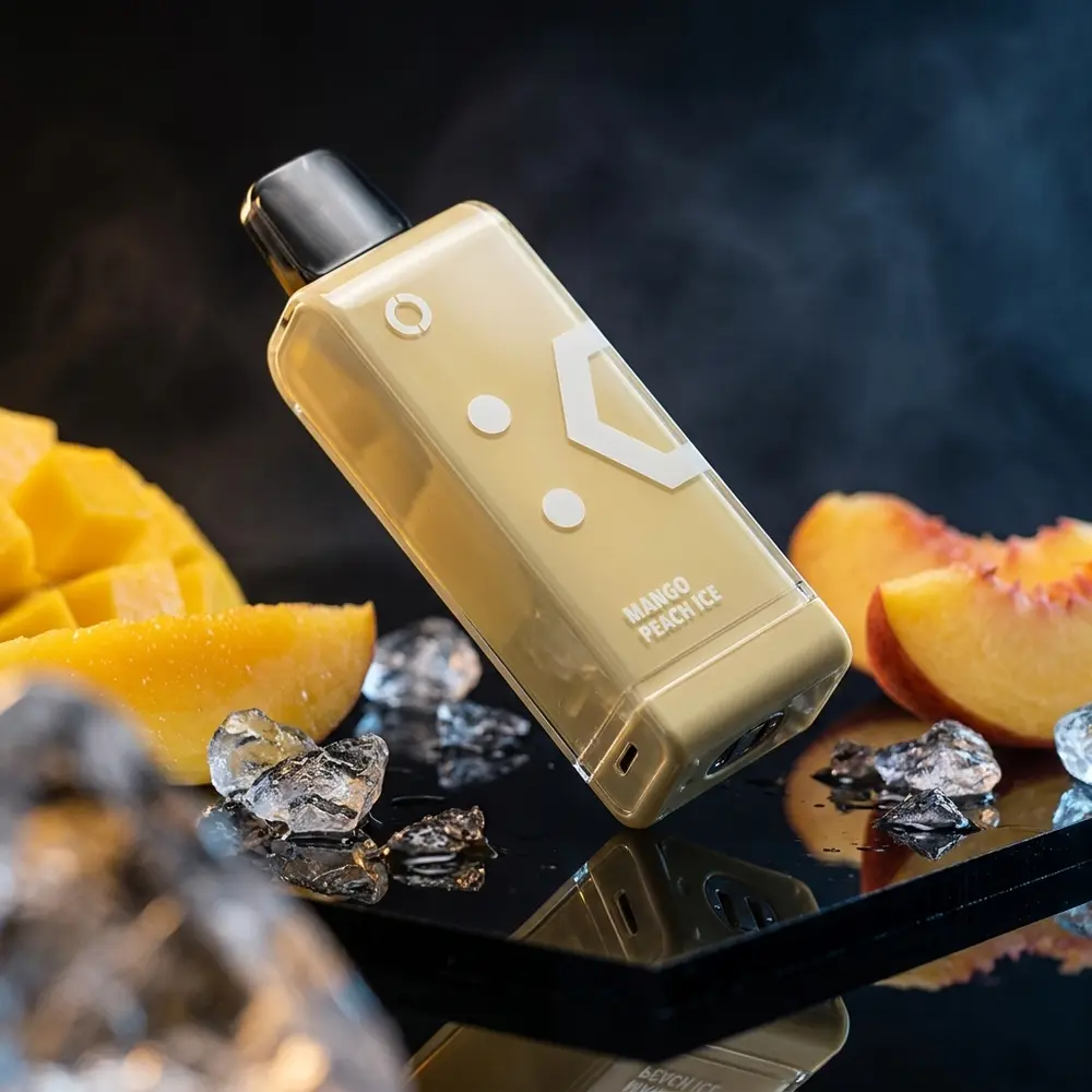Cartucho Elf Bar EW9000 Mango Peach Ice sobre base acrilica molhada com gelo e fatias de fruta - Vapor Gringo