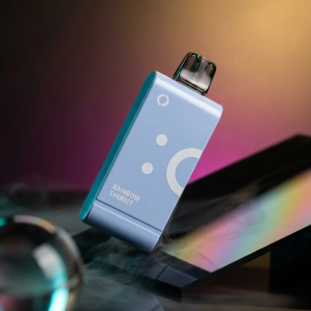 Cartucho Pod Elf Bar EW16000 Rainbow Sherbet sobre acrílico preto com reflexos pastel e iluminação dramática - Vapor Gringo