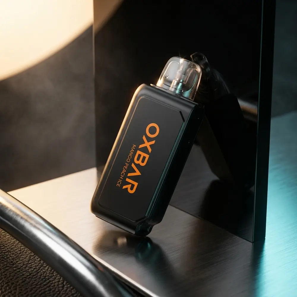 Cartucho refil Oxbar G32K suspenso sobre base acrilica preta com luzes dramáticas e reflexos intensos - Vapor Gringo