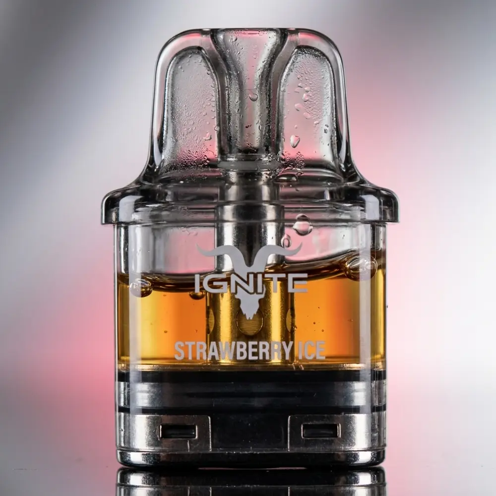 Close-up do cartucho refil Ignite P100 mostrando shell transparente, bobina mesh e gotas de condensacao - Vapor Gringo