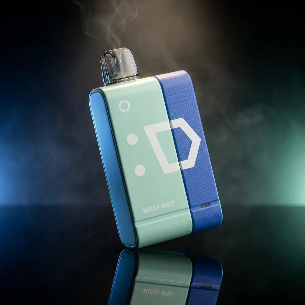 Pod descartável Elf Bar EW9000 Blue Razz Ice e Miami Mint sobre acrílico preto, iluminação azul e menta destacando o logo - Vapor Gringo