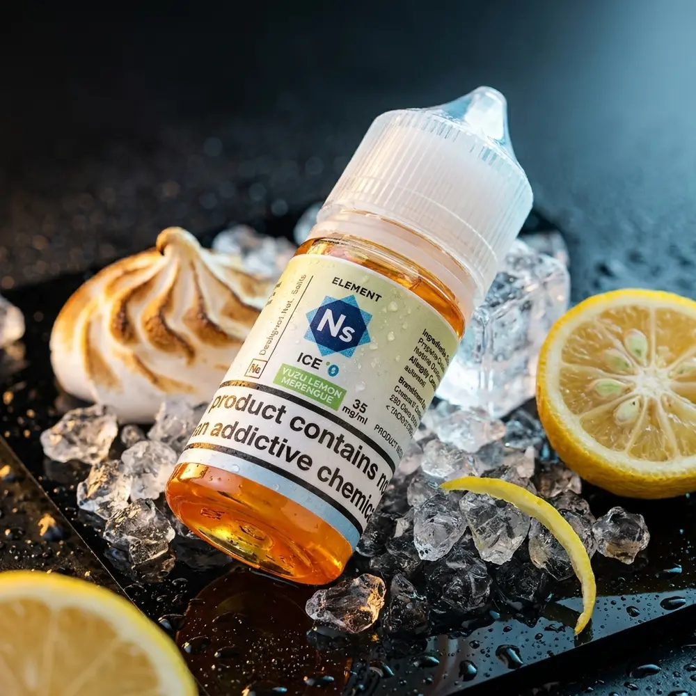 Frasco Element Salt Yuzu Lemon Meringue Ice sobre acrilico molhado com gelo e luzes quentes e frias - Vapor Gringo