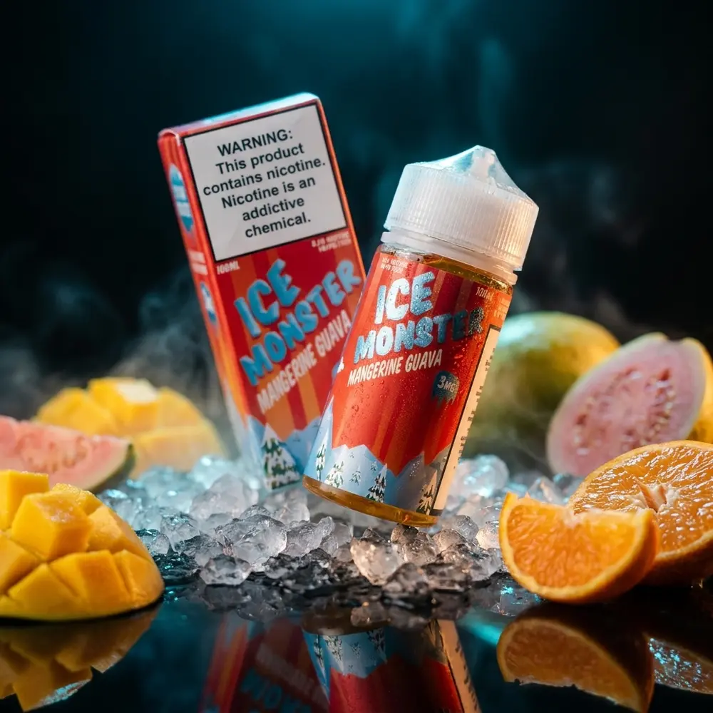 Frasco Jam Monster Mangerine Goiaba sobre acrilico preto com gelo, frutas tropicais e reflexos neon. - Vapor Gringo