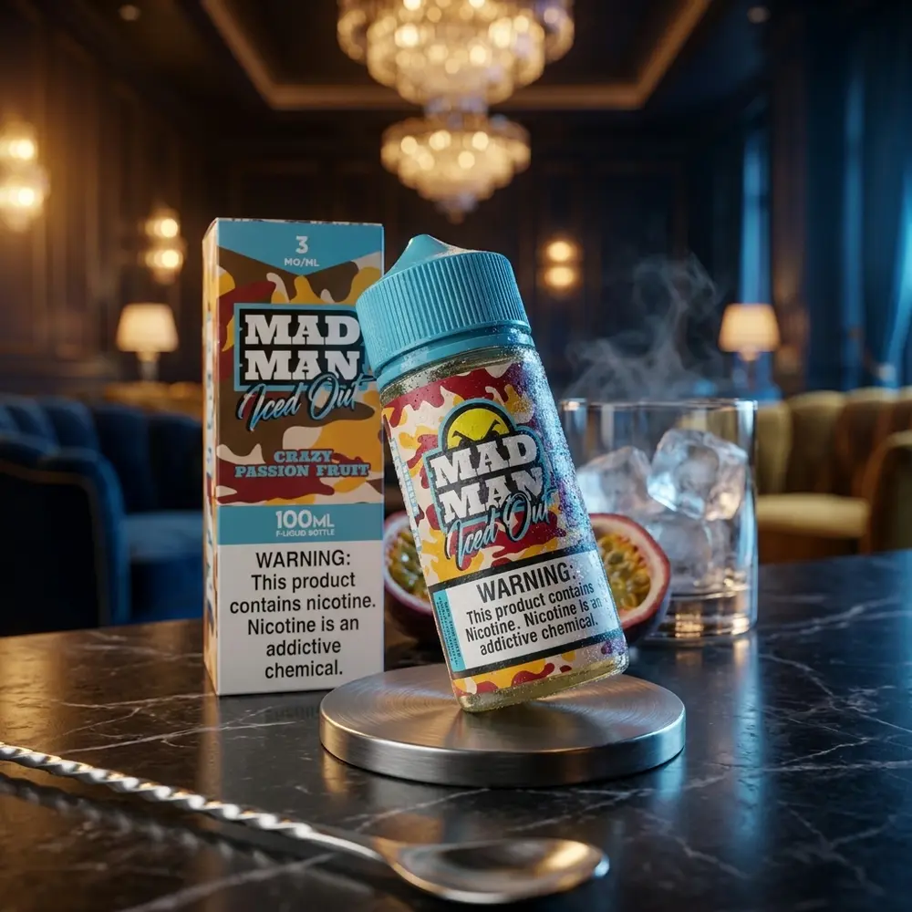 Frasco Liquido Mad Man Passion Fruit em balcão de lounge luxuoso com maracujá e copo ao fundo - Vapor Gringo