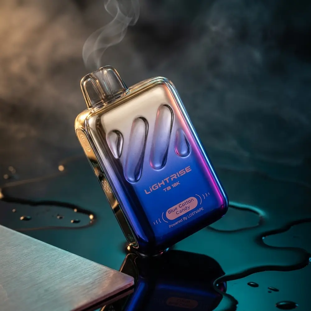 Pod descartavel Lost Vape Light Rise 18.000 puffs em estúdio, inclinado sobre acrilico molhado com reflexos e luzes teal-magenta - Vapor Gringo