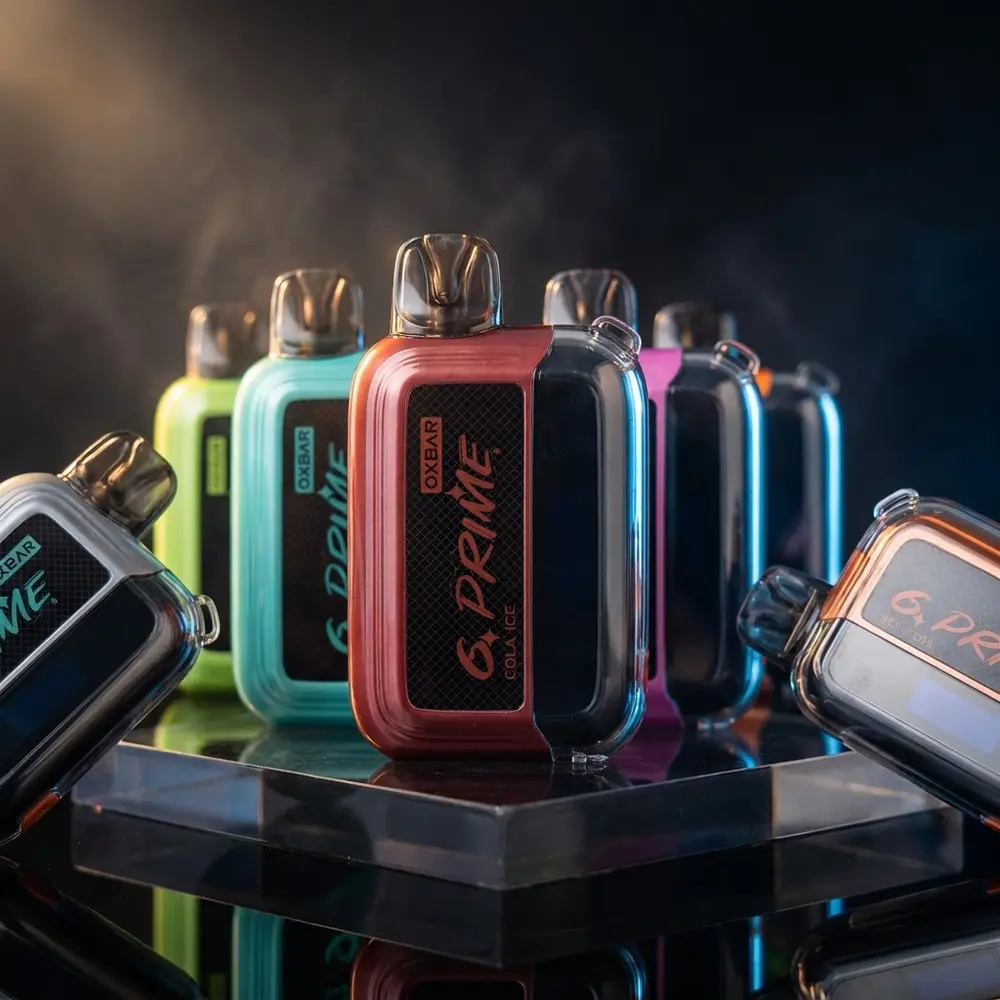 OxBar G Prime descartavel 25.000 puffs sobre base acrilica fumê com reflexos azulados e clima noturno - Vapor Gringo