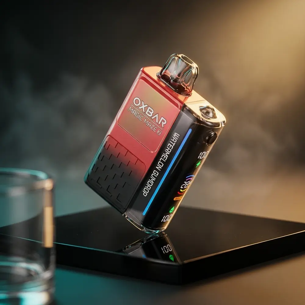 Pod Descartável Oxbar Magic Maze 2.0 Watermelon Gumdrop sobre base acrílica preta, reflexos teal e magenta e haze suave - Vapor Gringo