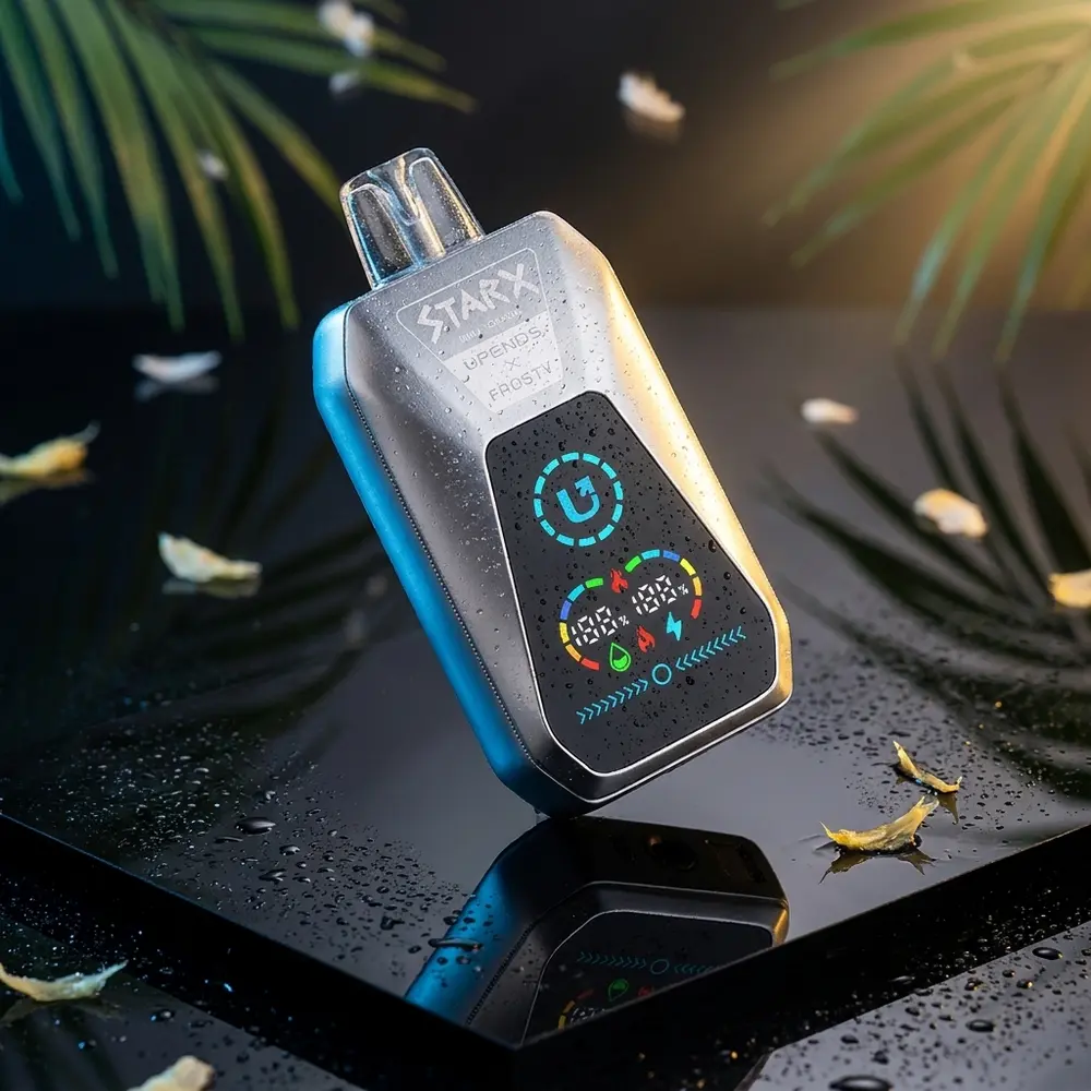 Pod descartavel StarX Frosty Pina Colada inclinado sobre base acrilica espelhada com gotas de condensacao - Vapor Gringo