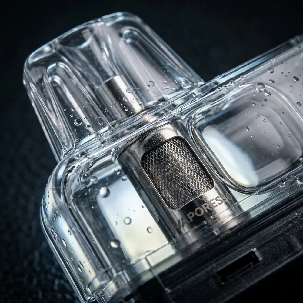 Close-up do pod Reposicao Eco Nano 6ml Vaporesso mostrando casco transparente, resistencia mesh e gotas - Vapor Gringo