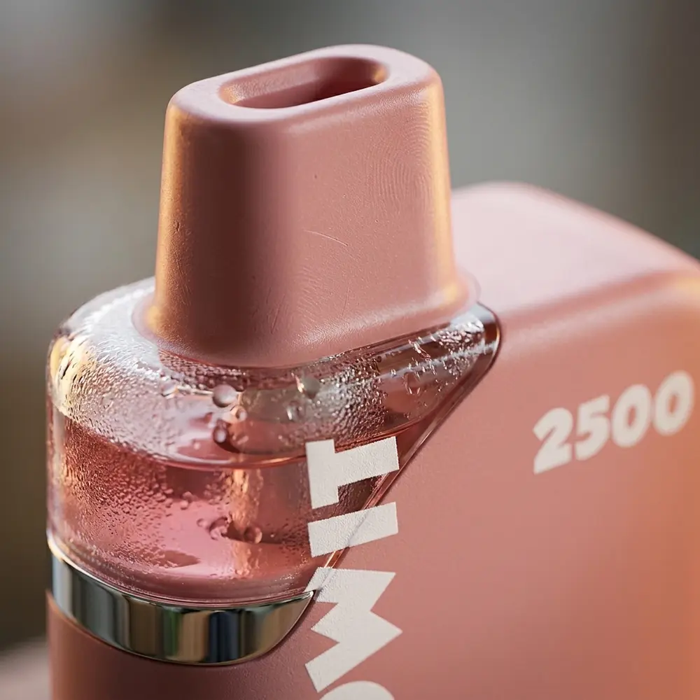 Detalhe macro do Refil Pod Lowit Juicy Peach mostrando textura, transparência e reflexos na ponta do bocal. - Vapor Gringo