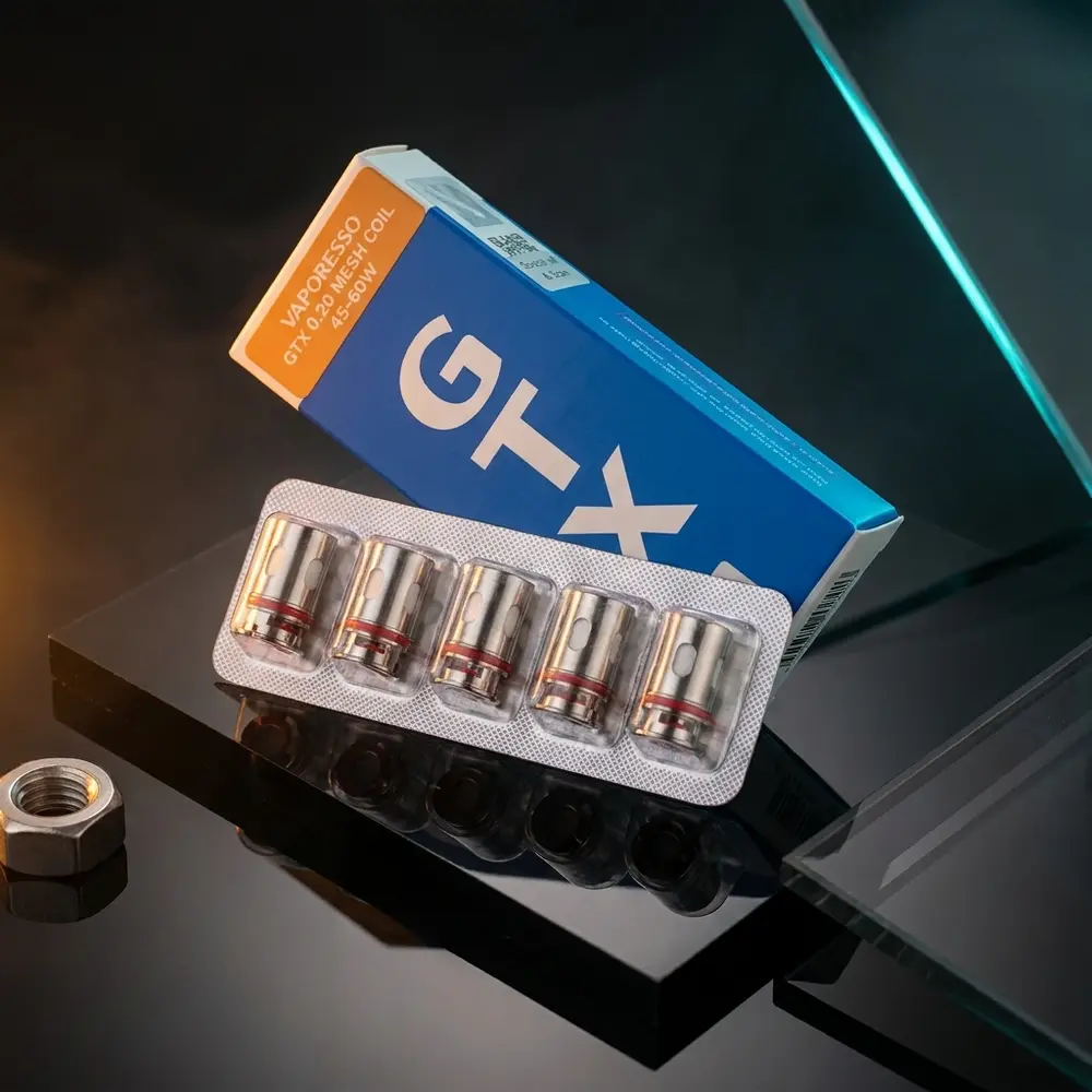 Resistência Coil GTX Mesh da Vaporesso sobre acrílico preto com luzes azul e âmbar e reflexos - Vapor Gringo