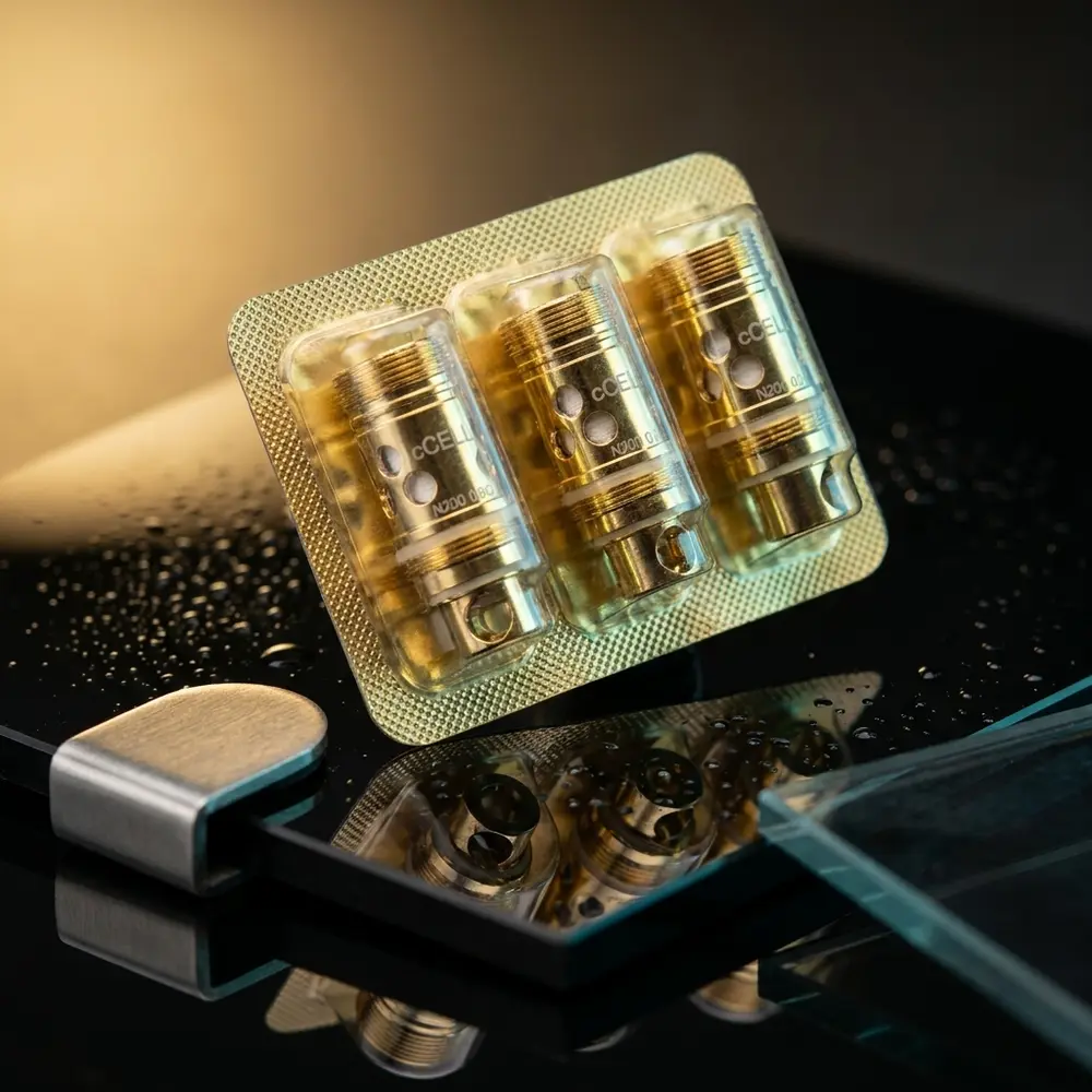 Pack da Resistência Coil Vape 88W King Sahara E-BUZZ suspenso sobre acrílico preto com reflexos dourados e ciano - Vapor Gringo
